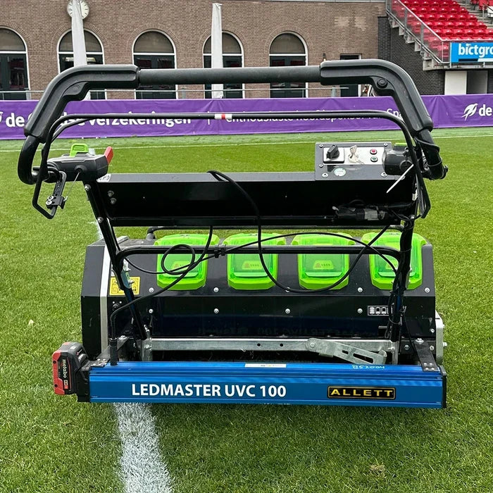 Allett C34 Battery Stadium Mower on a football pitch with the LEDMaster UVC100 attached.