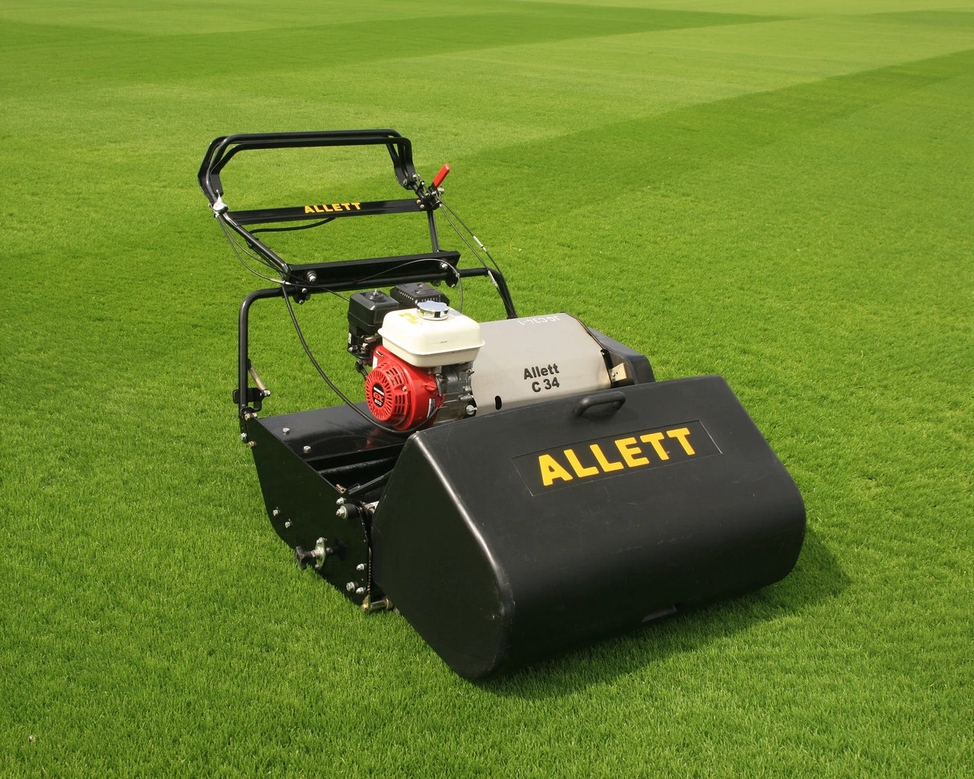 Allett C34 petrol cylinder mower on a large estate lawn