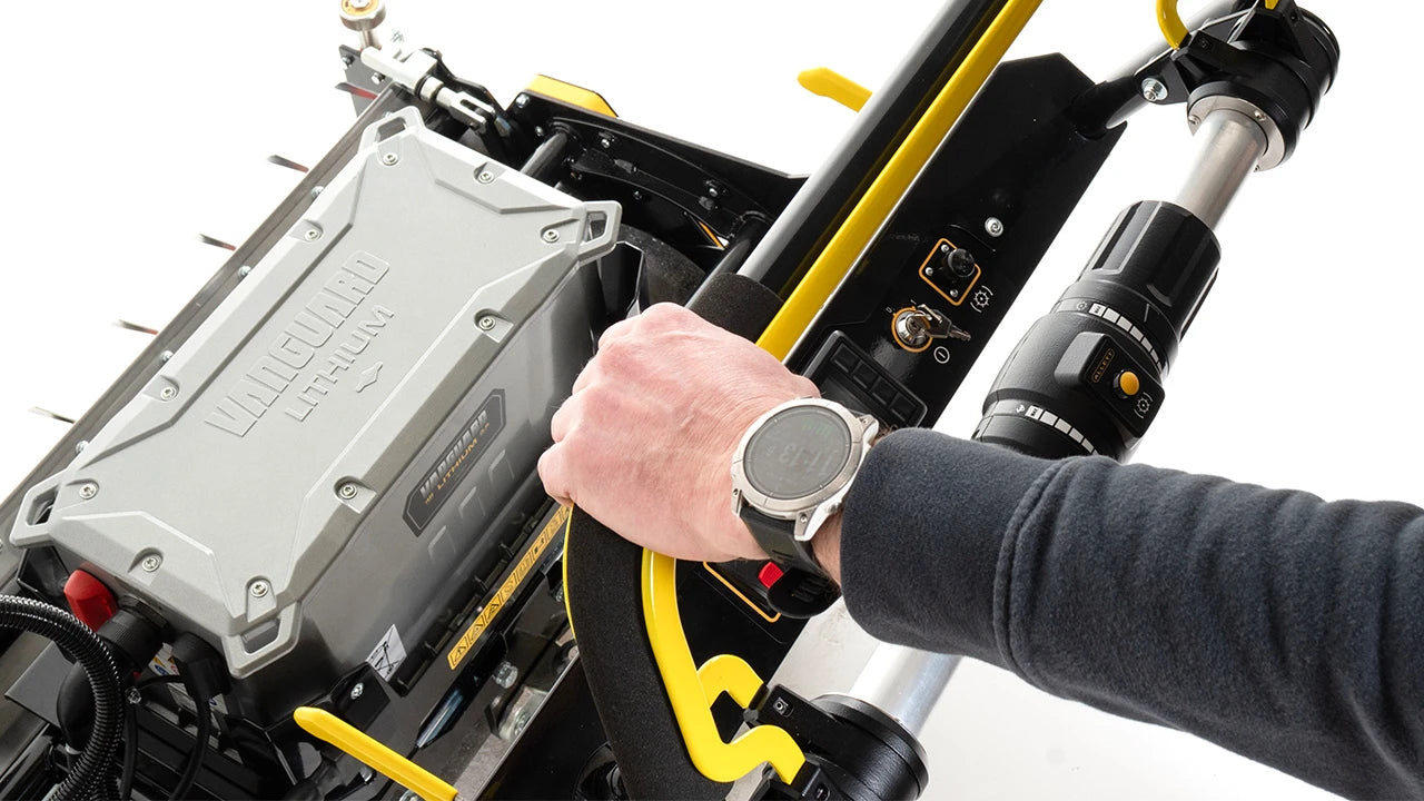 Close-up of Allett Omnia 34 operator controls with Vanguard lithium battery system