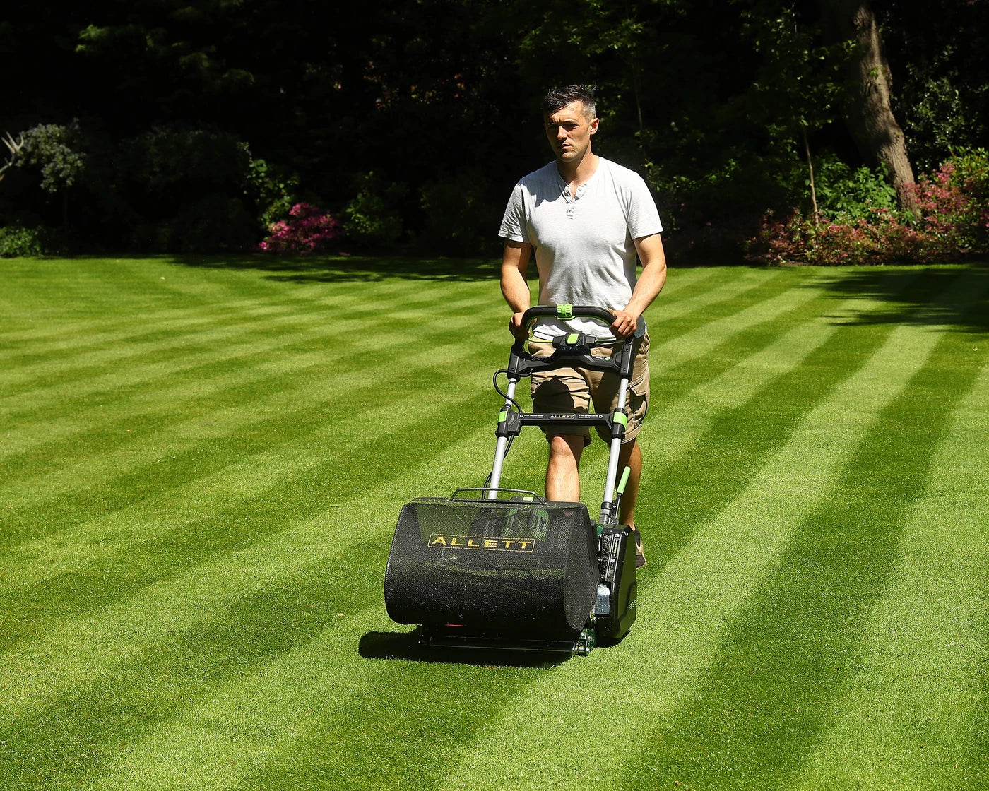 Allett Stirling 43/51 battery mower on a formal lawn